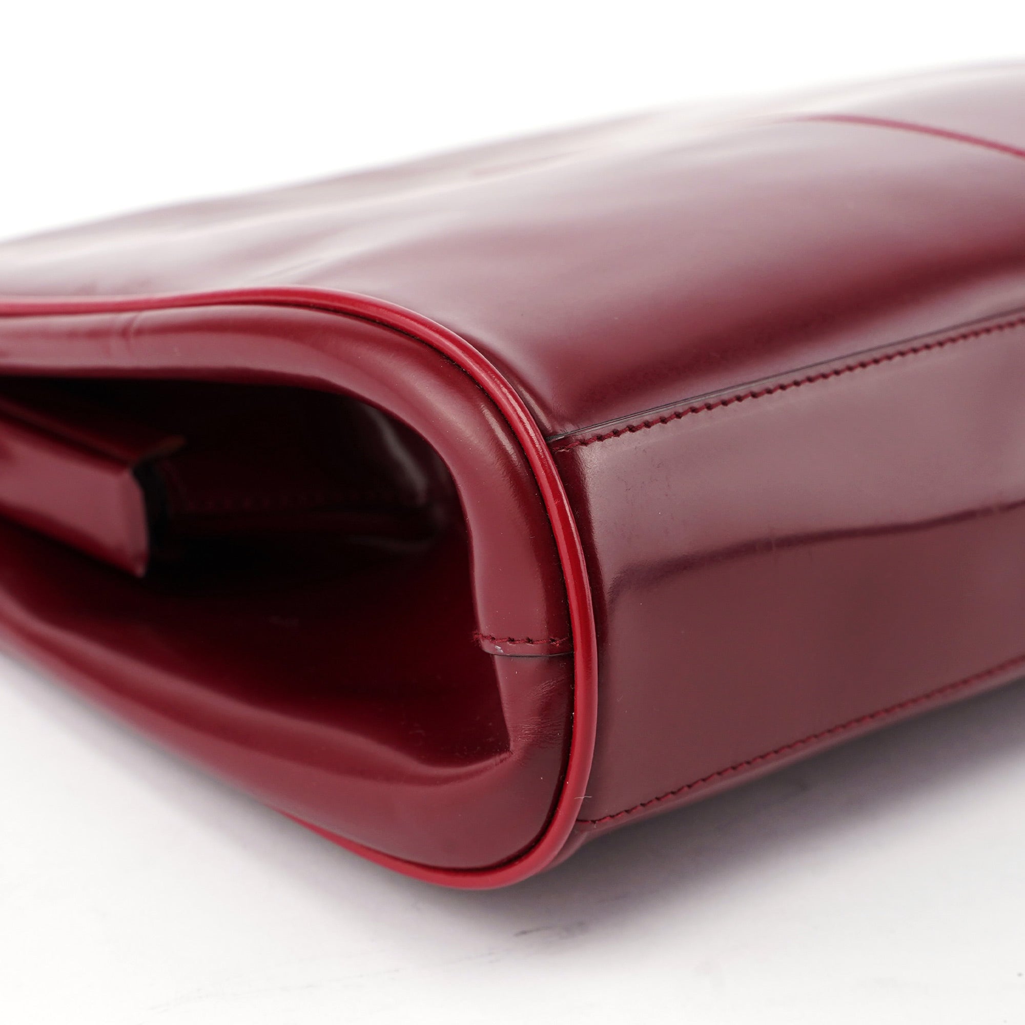 Burgundy Spazzolato Top Handle Clutch Bag