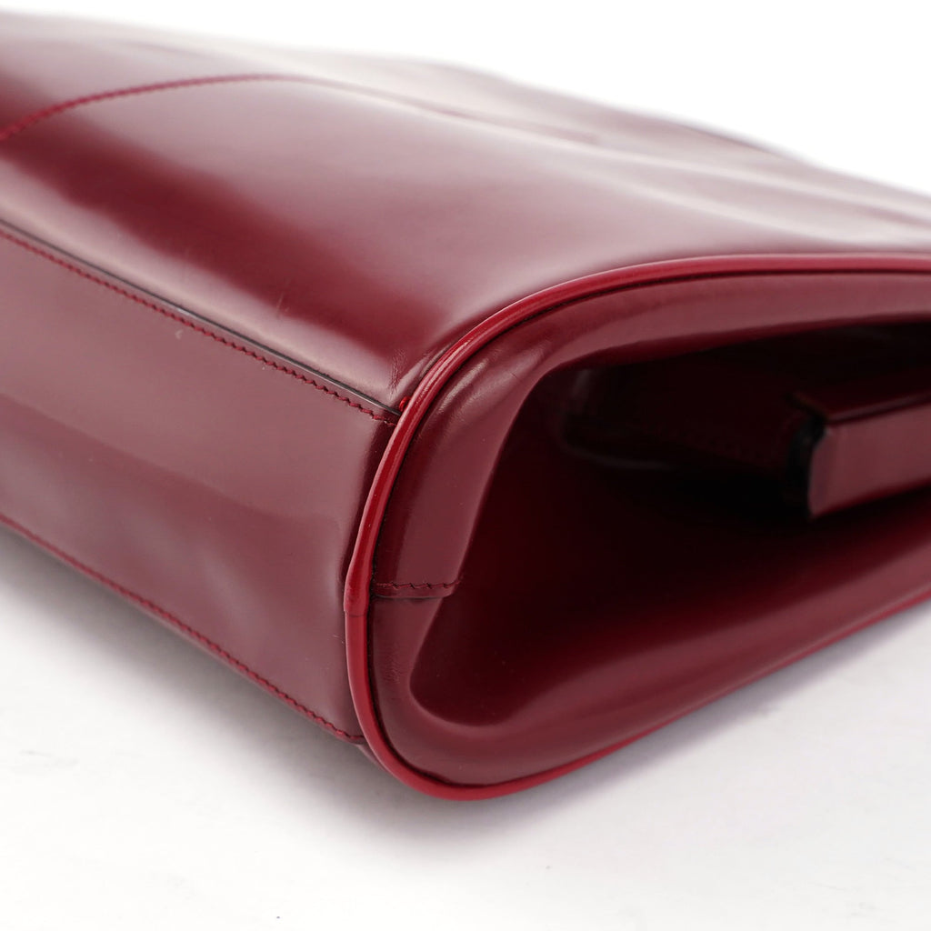 Burgundy Spazzolato Top Handle Clutch Bag