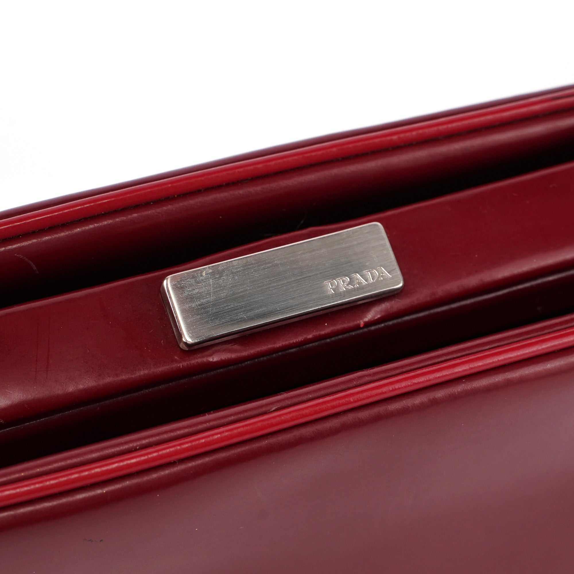 Burgundy Spazzolato Top Handle Clutch Bag
