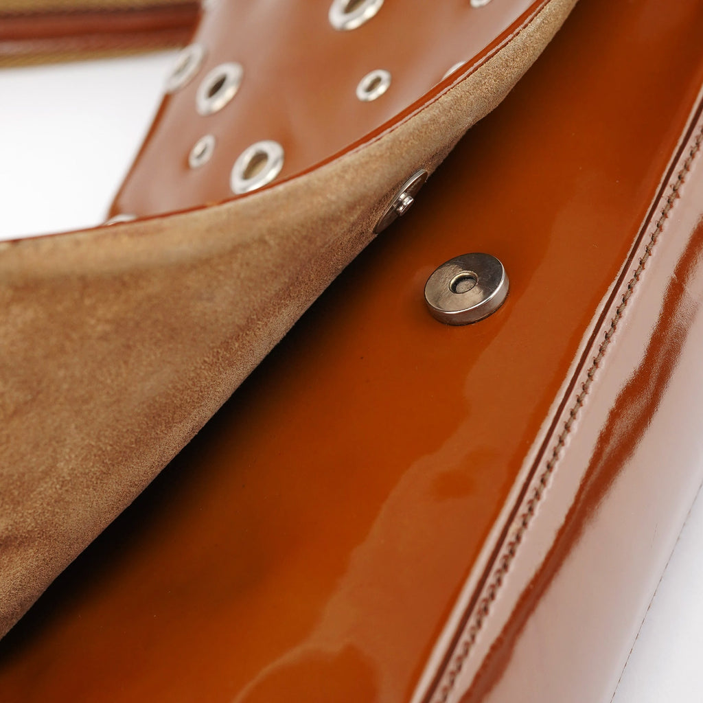 Fall 1999 Brown Patent Leather Eyelet Shoulder Bag