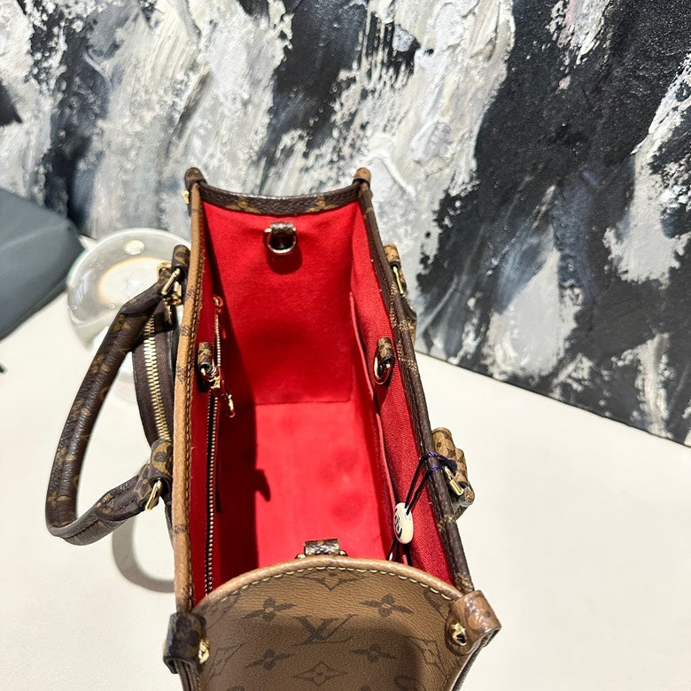 Lv on the go small with pouch microchipped 12576