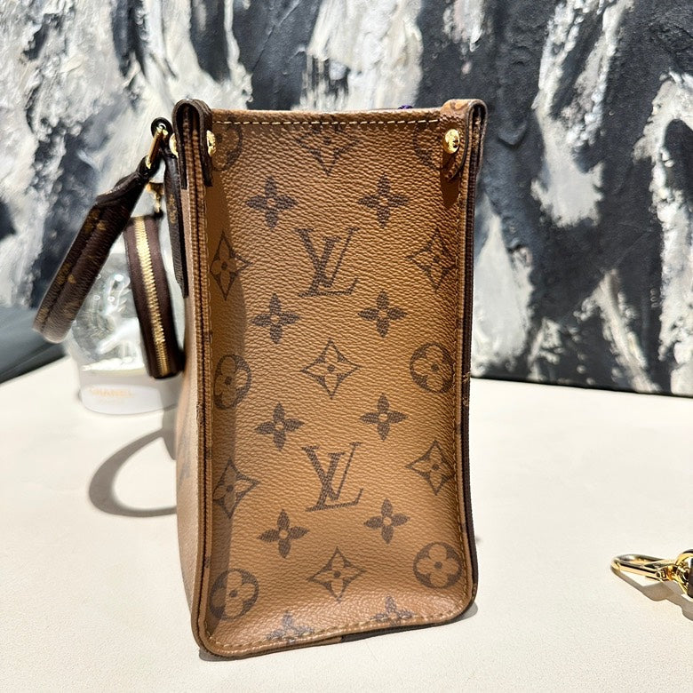 Lv on the go small with pouch microchipped 12576