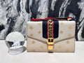   Gucci Sylvia medium.