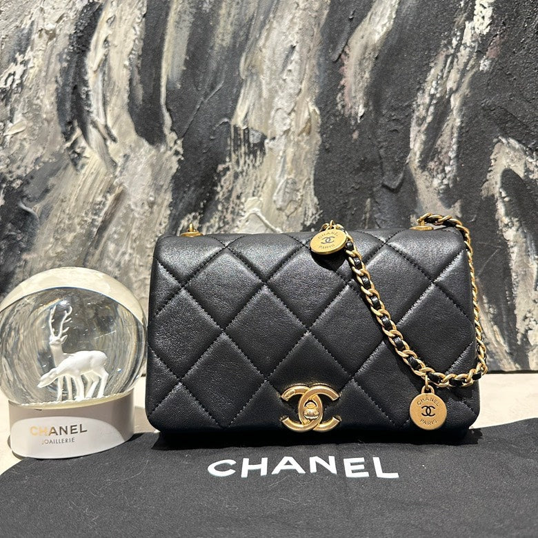   chanel 24s small black and gold coin chain microchipped 13144.