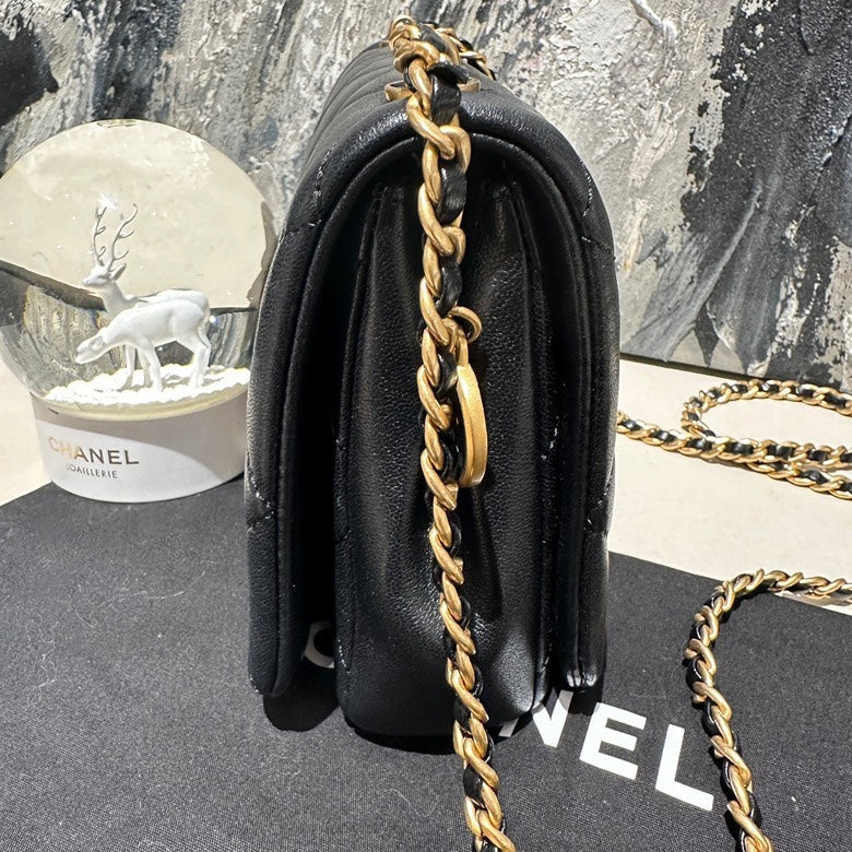 chanel 24s small black and gold coin chain microchipped 13144