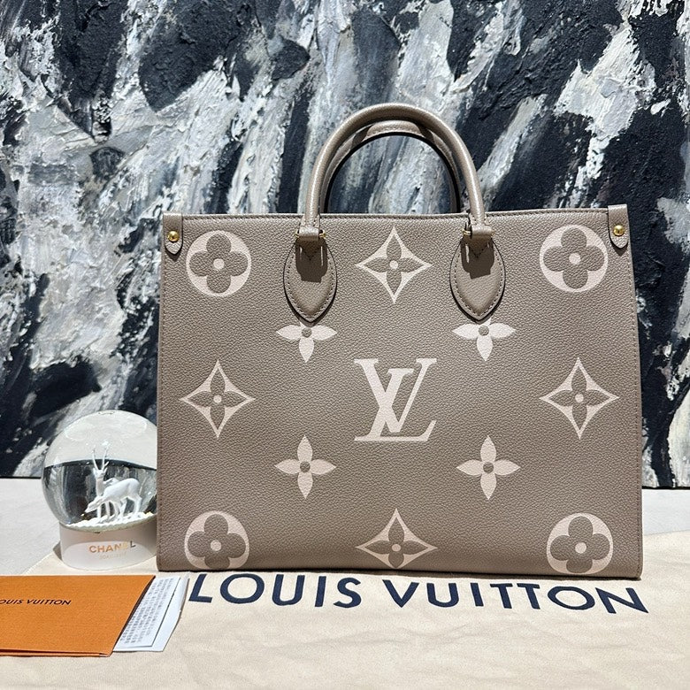 Lv on the go MM calfskin 13130