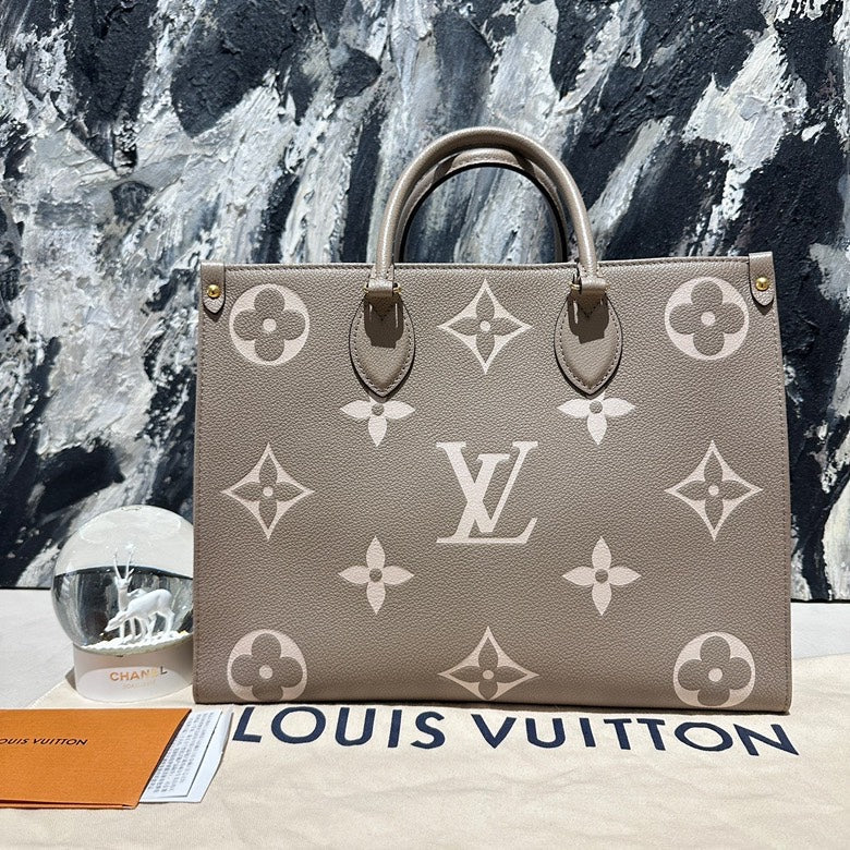 Lv on the go MM calfskin 13130