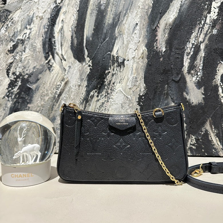   Lv pochette black microchipped 13240.