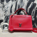   Lv lock me messenger bag 13264.