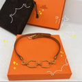   Hermes saddle bracelet.