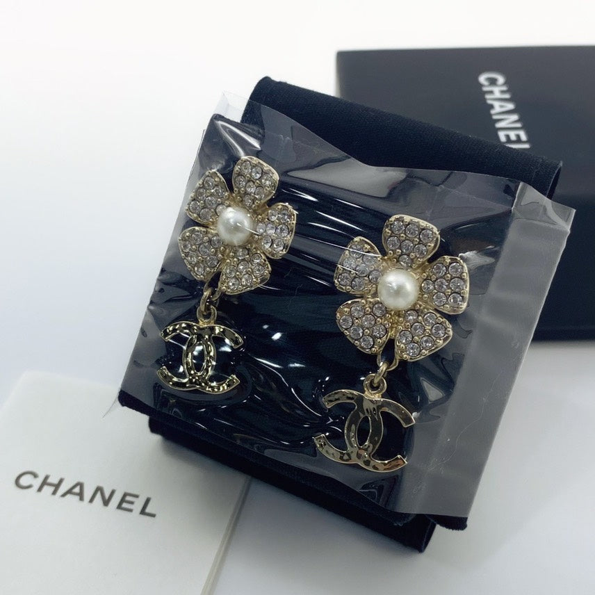 Chanel classic floral collection camellia pearl rhinestone metal earrings
