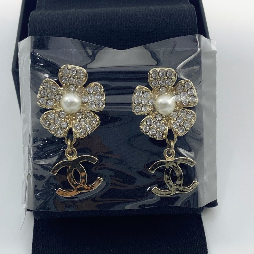 Chanel classic floral collection camellia pearl rhinestone metal earrings