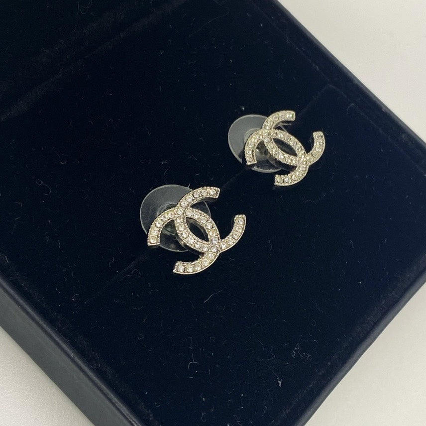 Chanel double C logo collection pave diamond earrings