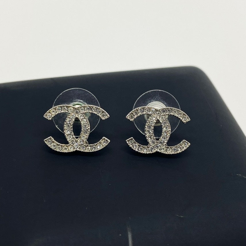 Chanel double C logo collection pave diamond earrings