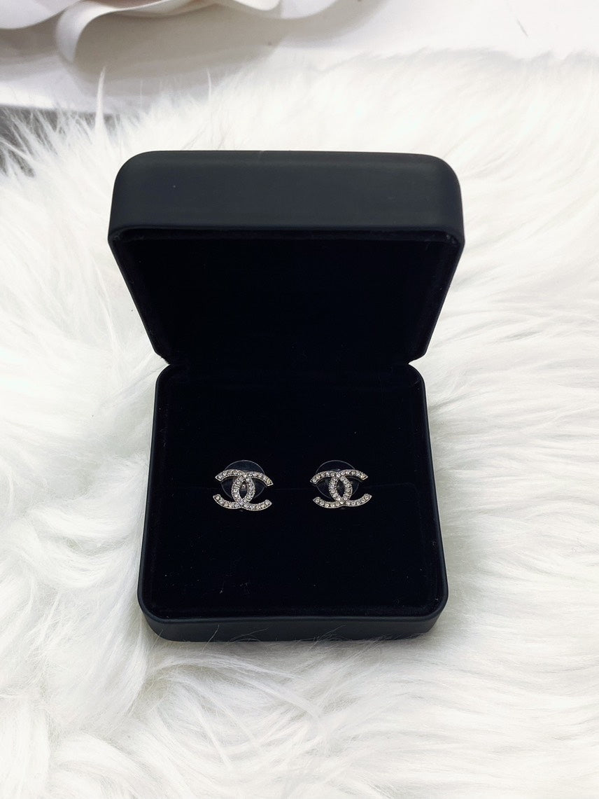 Chanel double C logo collection pave diamond earrings