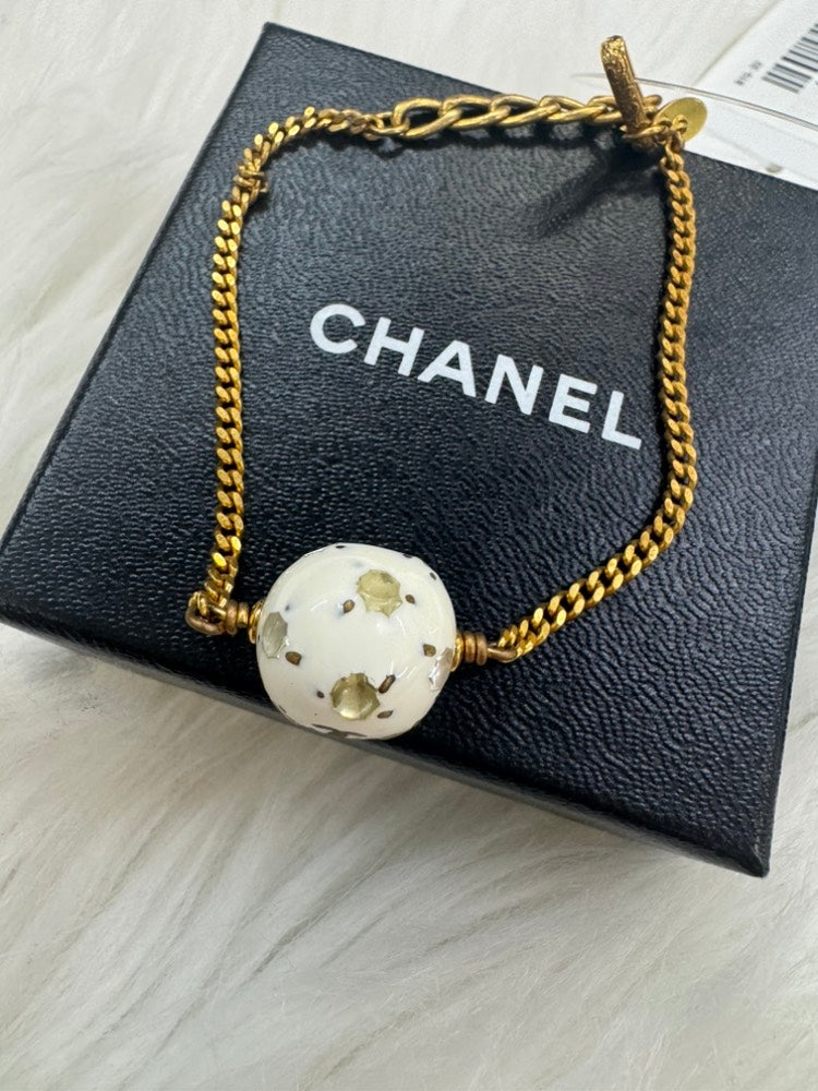 - vintage Chanel 98P gold-tone chain bracelet with a white CC logo ball charm
