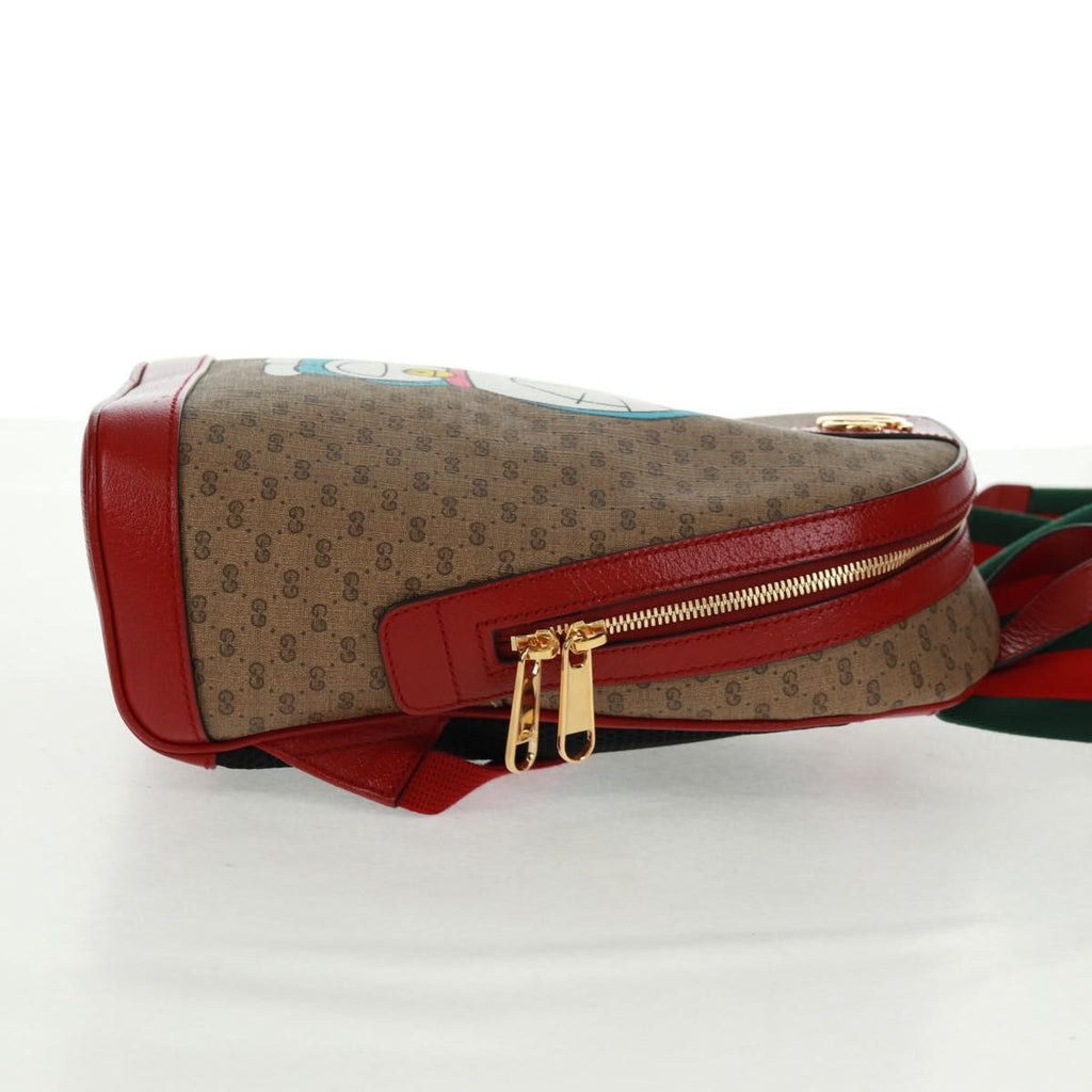 Gucci Doraemon Zip Backpack Printed Mini Gg Coated Canvas Beige Canvas Backpack Bag (Authentic  )