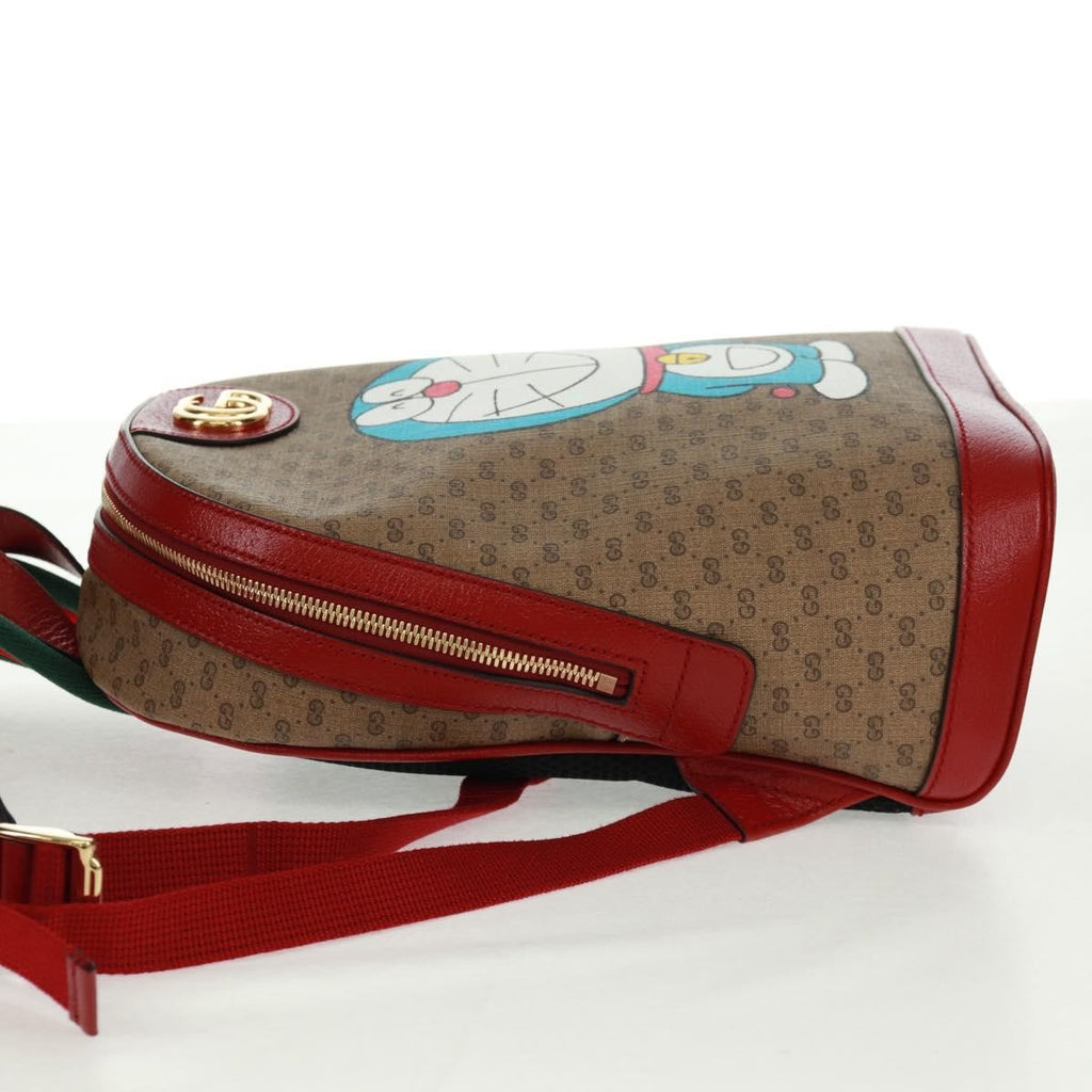 Gucci Doraemon Zip Backpack Printed Mini Gg Coated Canvas Beige Canvas Backpack Bag (Authentic  )