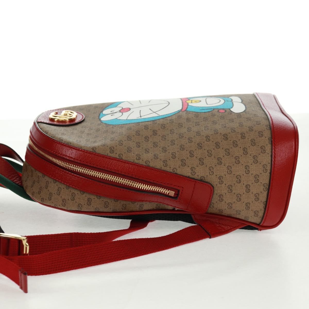 Gucci Doraemon Zip Backpack Printed Mini Gg Coated Canvas Beige Canvas Backpack Bag (Authentic  )