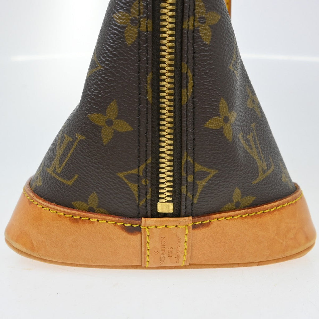 Louis Vuitton Alma Handbag Monogram Canvas Brown Canvas Handbag ( )