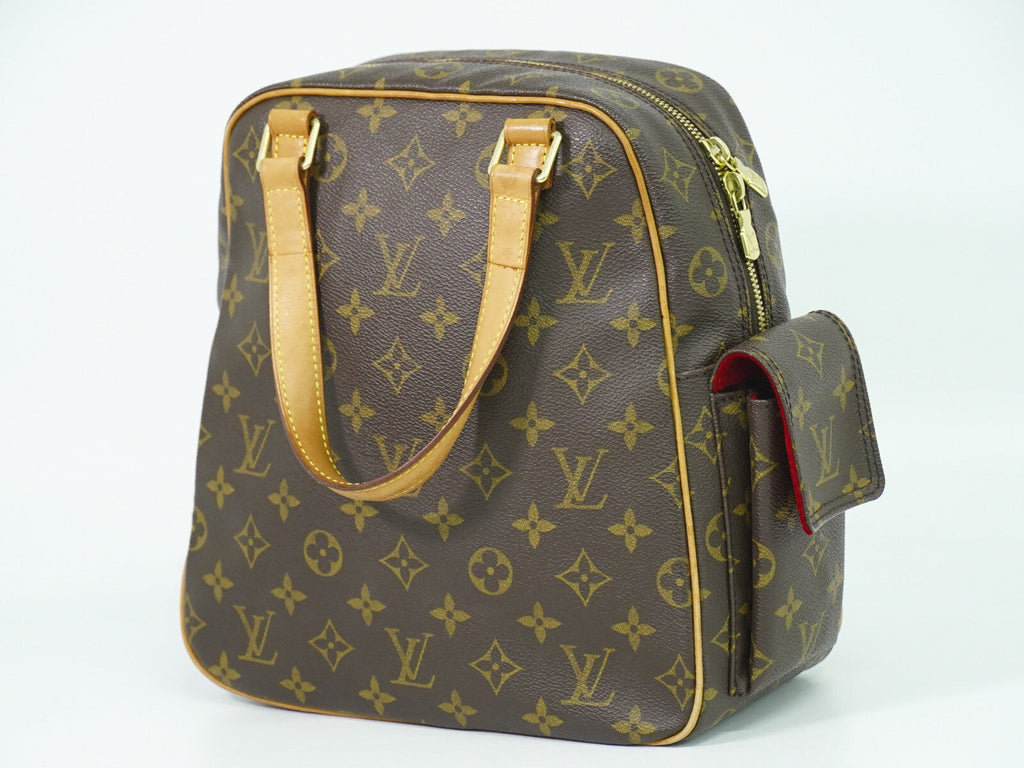 Louis Vuitton Excentri-Cite Handbag Monogram Canvas Brown Canvas Handbag (Authentic  )