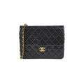 ITEM 29 - Chanel Vintage Square Flap Lambskin Black- Series 5